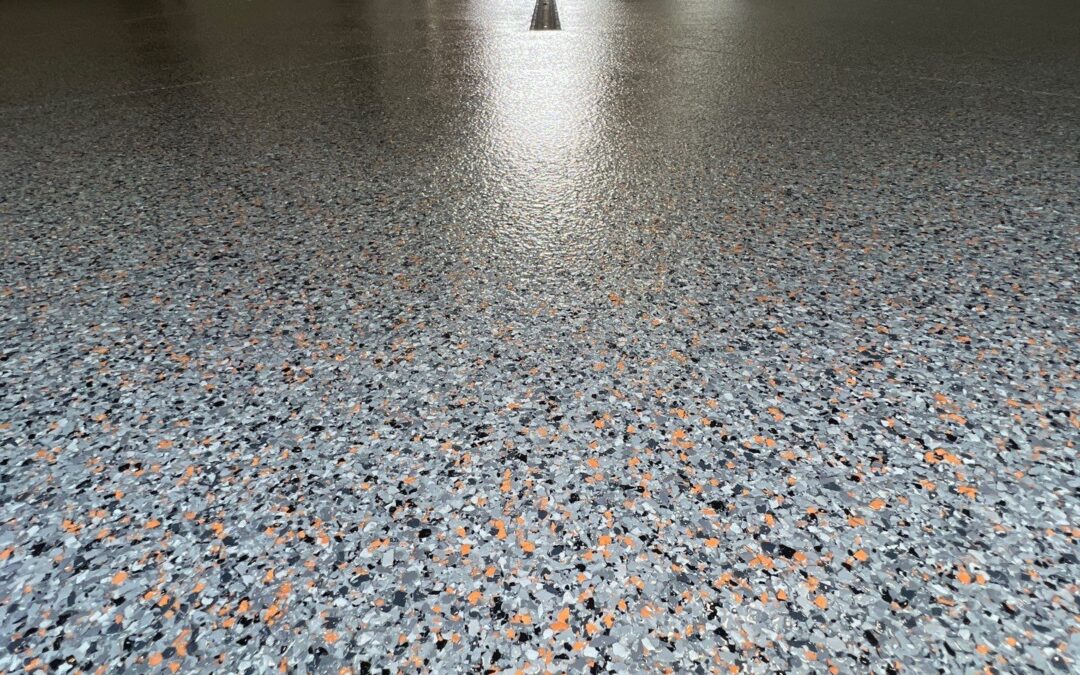Epoxy vs. Polyurea vs. Concrete Stain: Which Basement Floor Coating is Best for Grand Rapids Homes?